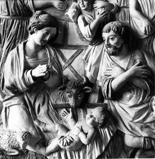 retable croisillon nord, haut-relief : L'Adoration des Bergers, détail Enfant Jésus