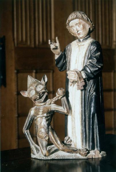 groupe sculpté : saint Bernard de Menthon et le diable