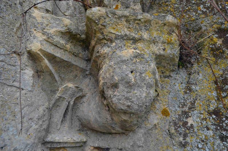 détail d'un visage sculpté, façade Sud