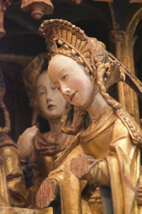 retable : scènes de la vie de la Vierge, l'Arbre de Jessé, détail : visage d’une des femmes de la scène de la Présentation au Temple