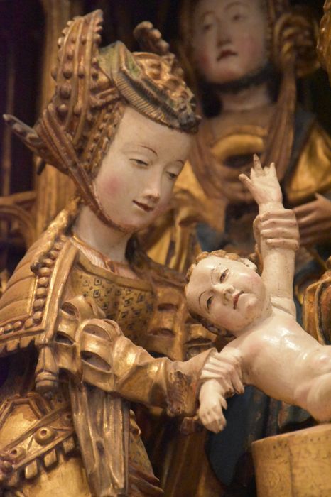 retable : scènes de la vie de la Vierge, l'Arbre de Jessé, détail : visage de la femme tenant l’enfant Jésus lors de sa Circoncision