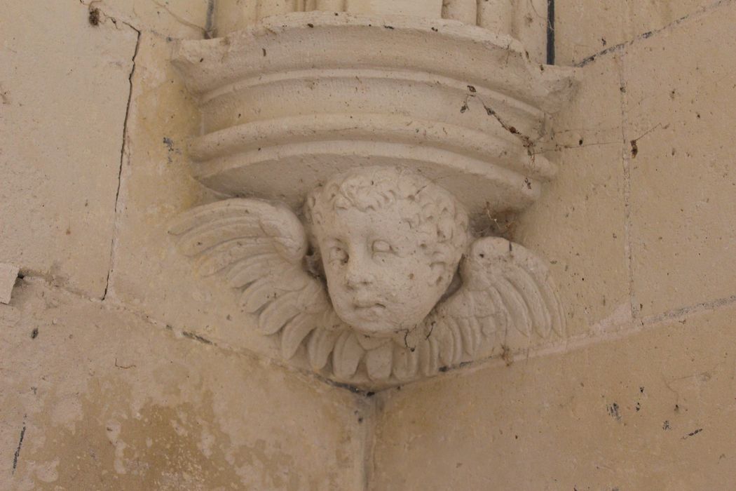 chapelle sud, détail d'un culot sculpté d'une tête d'ange