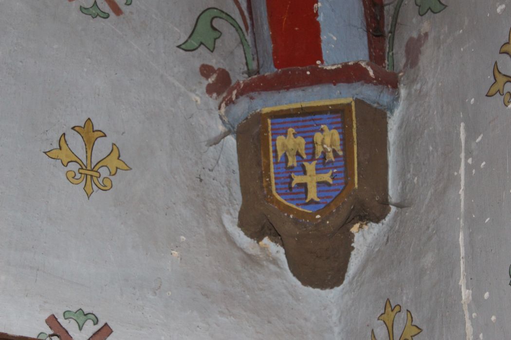 Eglise Saint-Pourçain : Chapelle latérale sud, détail d'un blason peint