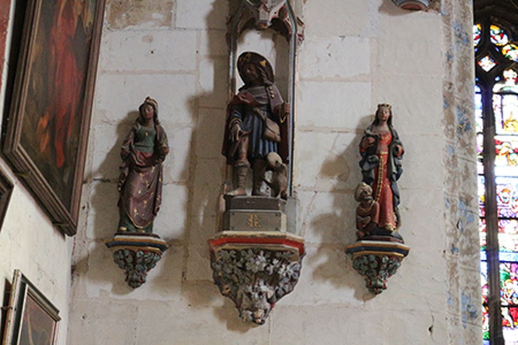 Ensemble de trois statues (statuettes) : Saint Roch ; sainte Catherine et sainte Geneviève