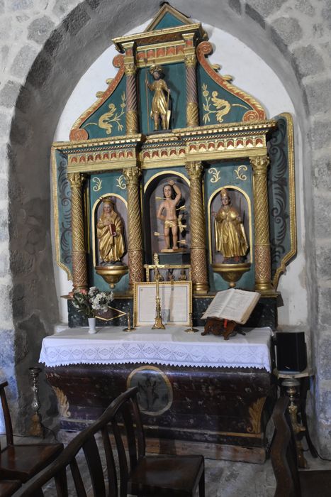 retable latéral, statues (statuettes) : Saint Sébastien, sainte Anne, saint Eloi, saint Isidore