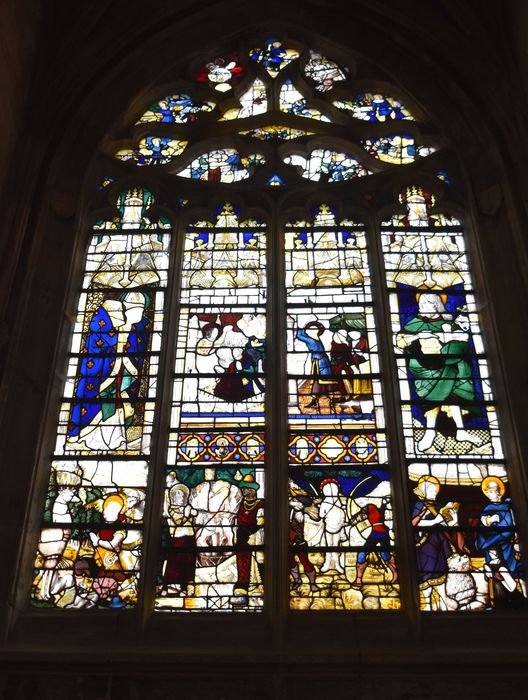 verrière de la chapelle Saint-Nicolas : Saint Denis, saint Jean-Baptiste, vision de saint Hubert, saint Marc, supplice des philosophes, scènes de la vie de saint Sébastien