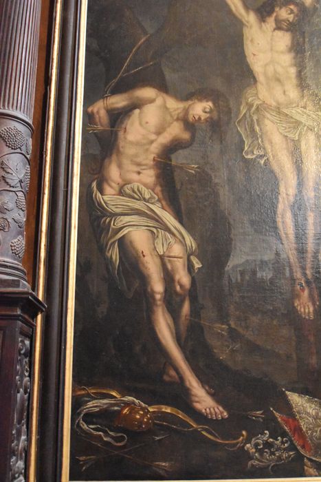 tableau : Crucifixion entre saint Sébastien, saint Jacques et un abbé, vue partielle