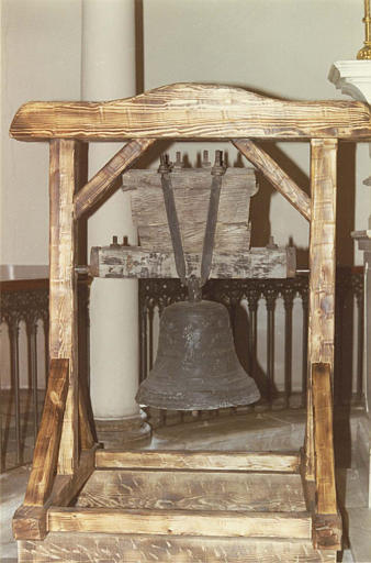 Cloche en bronze à décor de personnage en léger relief, 1790