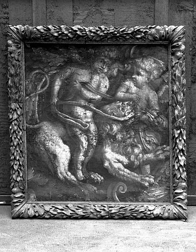 Peinture sur toile avec cadre en bois sculpté : Lion et deux enfants