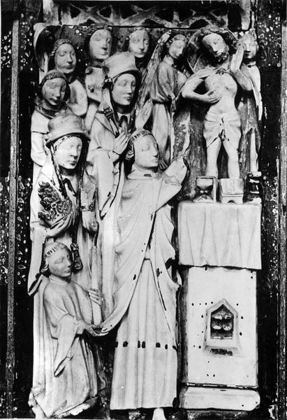 retable, un bas-relief : saint Etienne, L' Annonciation, L' Adoration des Mages, La Messe de saint Grégoire, L' Assomption, Le Couronnement de la Vierge, saint Laurent