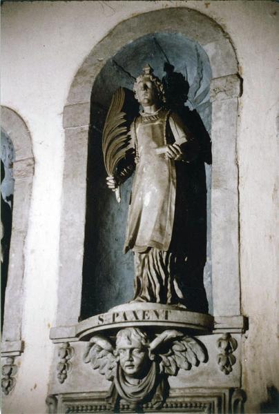 statue et sa console : saint Eloi, saint Paxent, saint Hubert, saint Jean l'Evangéliste