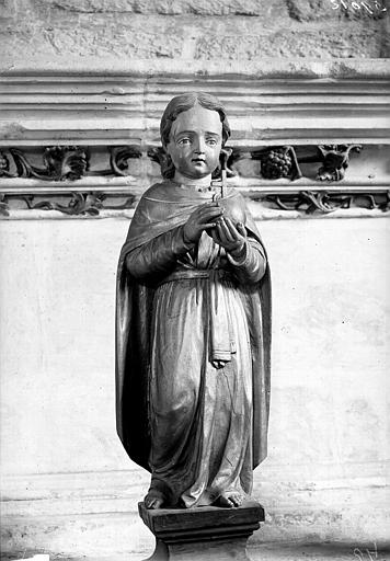 Statue de l'Enfant Jésus et détail de frise