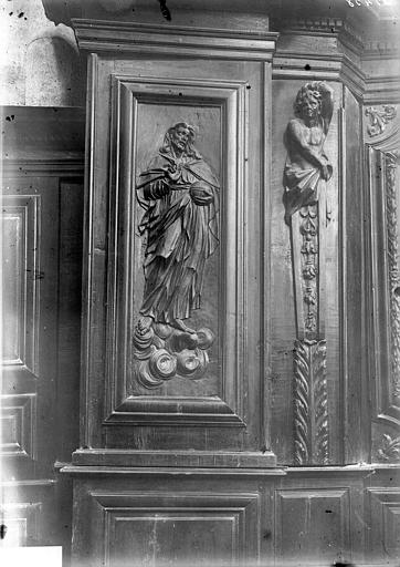 Panneau en bois sculpté : le Christ et cariatide