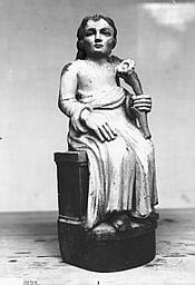 Horloge du choeur, femme assise