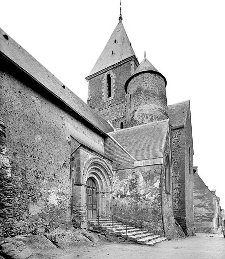 Façade sud vue depuis l'angle sud-ouest. Clocher et portail