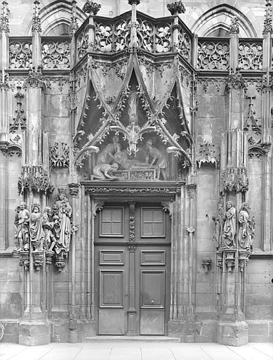 Façade nord, portail Saint-Laurent vu de face : Ebrasements, tympan et voussures. L'Adoration des mages, le martyre de saint Laurent