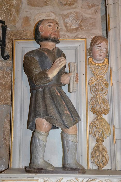 groupe sculpté : saint Yves le riche et le pauvre, vue partielle