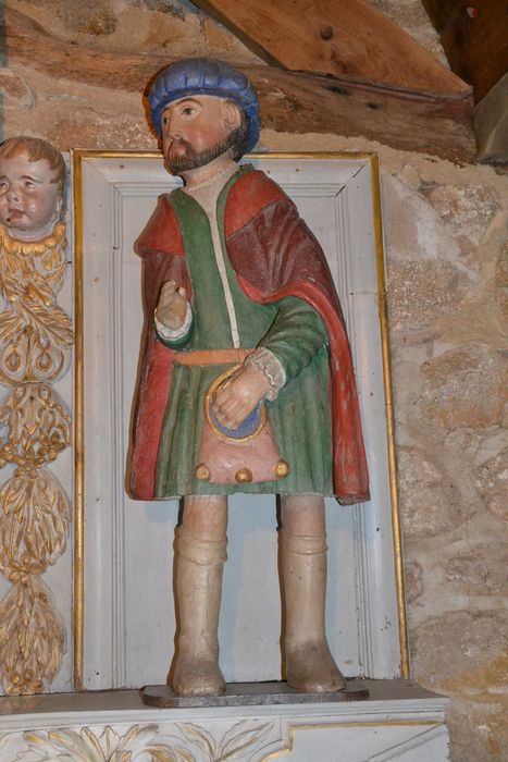 groupe sculpté : saint Yves le riche et le pauvre, vue partielle
