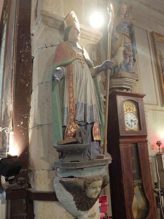 statue : Saint évêque (Saint Eloi ?) et son culot : Tête d'angelot