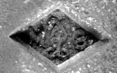 Garantie de Paris, Merienne & Guillet (M.G.), symbole : une agrafe à la porte