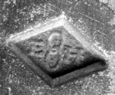Garantie de Paris, Eugène Hanau (E.H.), symbole : deux anneaux entrelacés