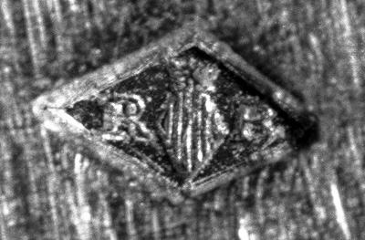 Garantie de Paris, Ramon Bago (R.B.), symbole : une plume à écrire