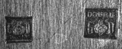Garantie de Paris, Georges Dentzer (G.D.), symbole : une serre d'oiseau tenant une dent