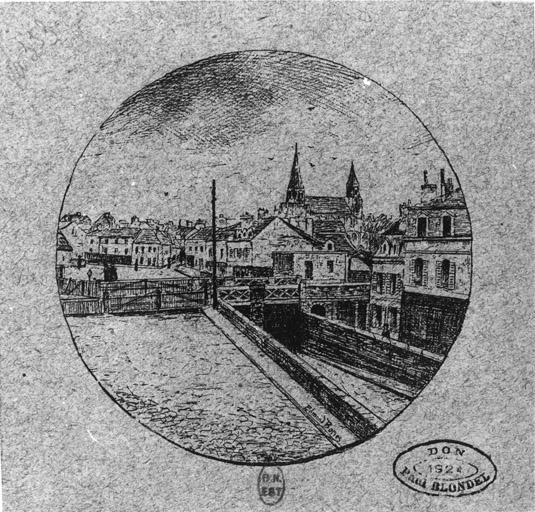 Vue de la ville avec, au 1er plan, la tranchée de la voie ferrée