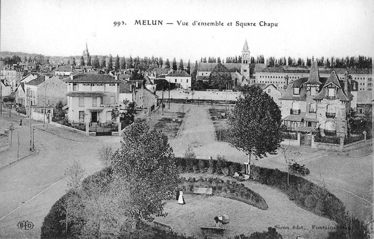 Vue générale de la partie nord du lotissement, 1er quart du 20e siècle. Au premier plan, le square Chapu. Dans le fond, l'île Saint-Etienne avec l'église Notre-Dame.