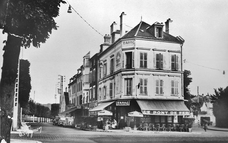 Vue du quai de Seine, rive gauche, en amont du pont de fer, vers 1940.