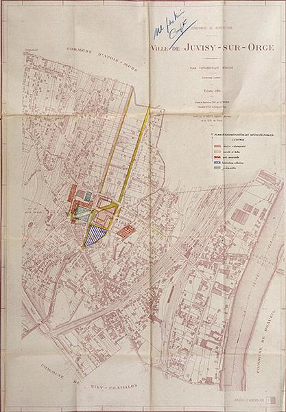 Plan de reconstruction des bâtiments publics : projet intermédiaire comportant les bâtiments communaux ainsi que le premier périmètre de reconstruction et d'aménagement ; porte la mention manuscrite 'Ne pas tenir compte'.