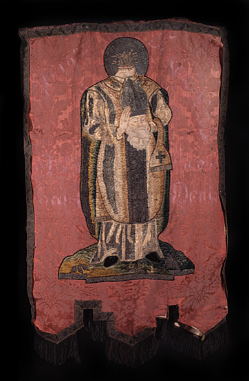 Figure de saint Denis martyr sur l'autre face.