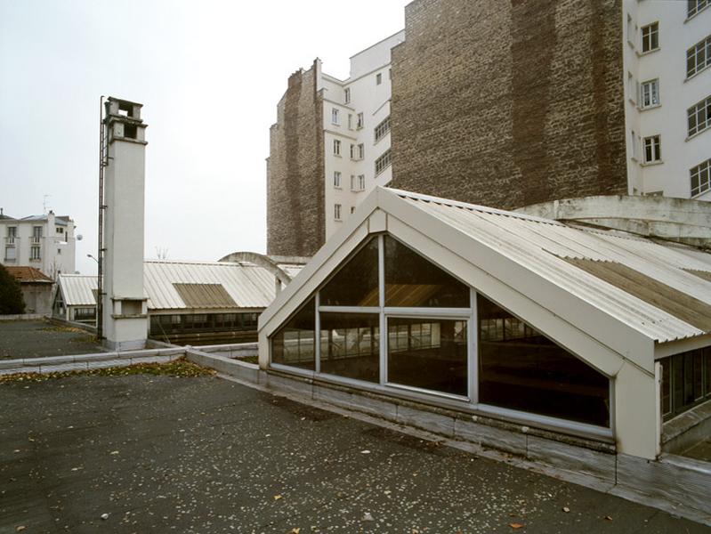 Toiture des trois halles et cheminée de la chaufferie.