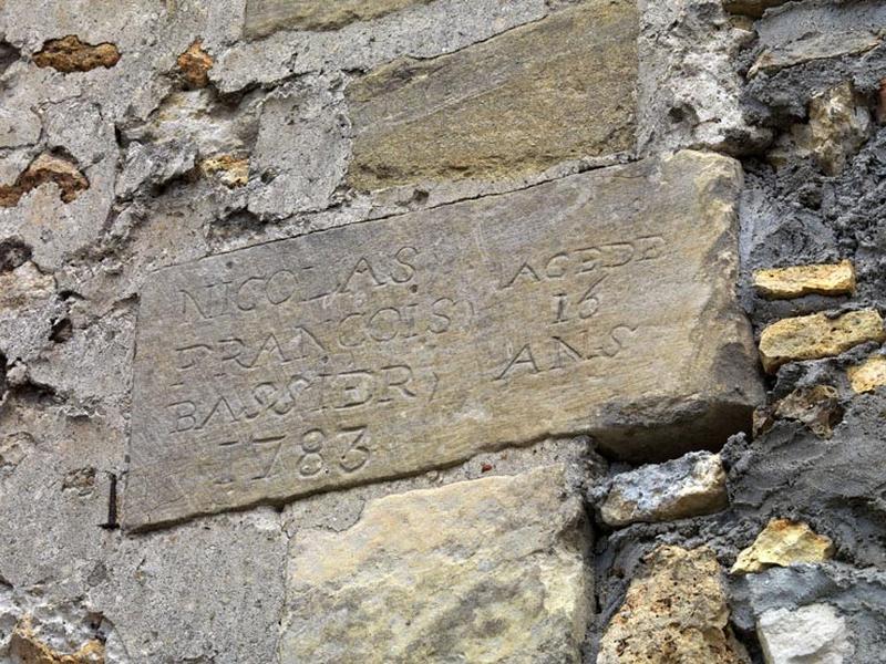 inscription sur l'ancien pressoir