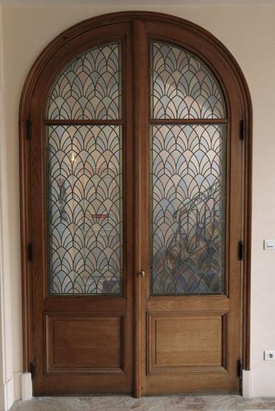 Détail de la porte, à main droite du vestibule d'entrée, située dans la partie agrandie en 1928.