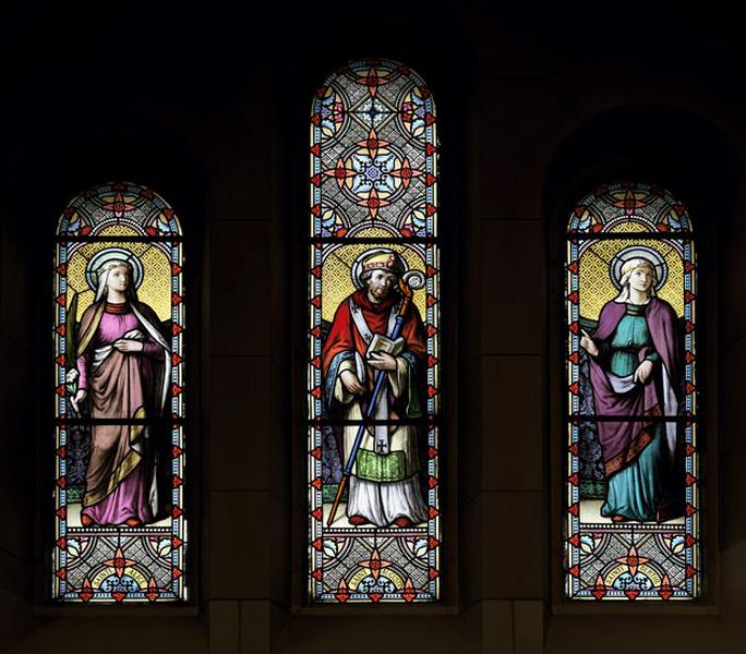 Groupe de trois verrières : sainte Alice, saint Augustin et sainte Berthe.