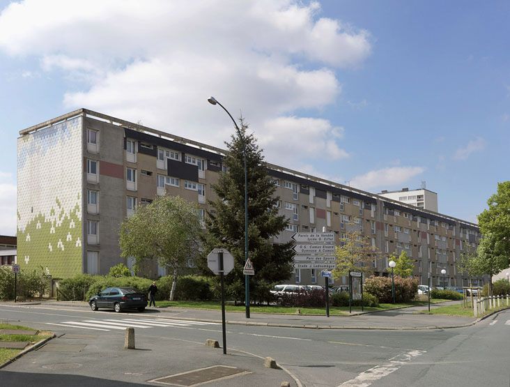Façade arrière et pignon décoré avant rénovation de la barre A.