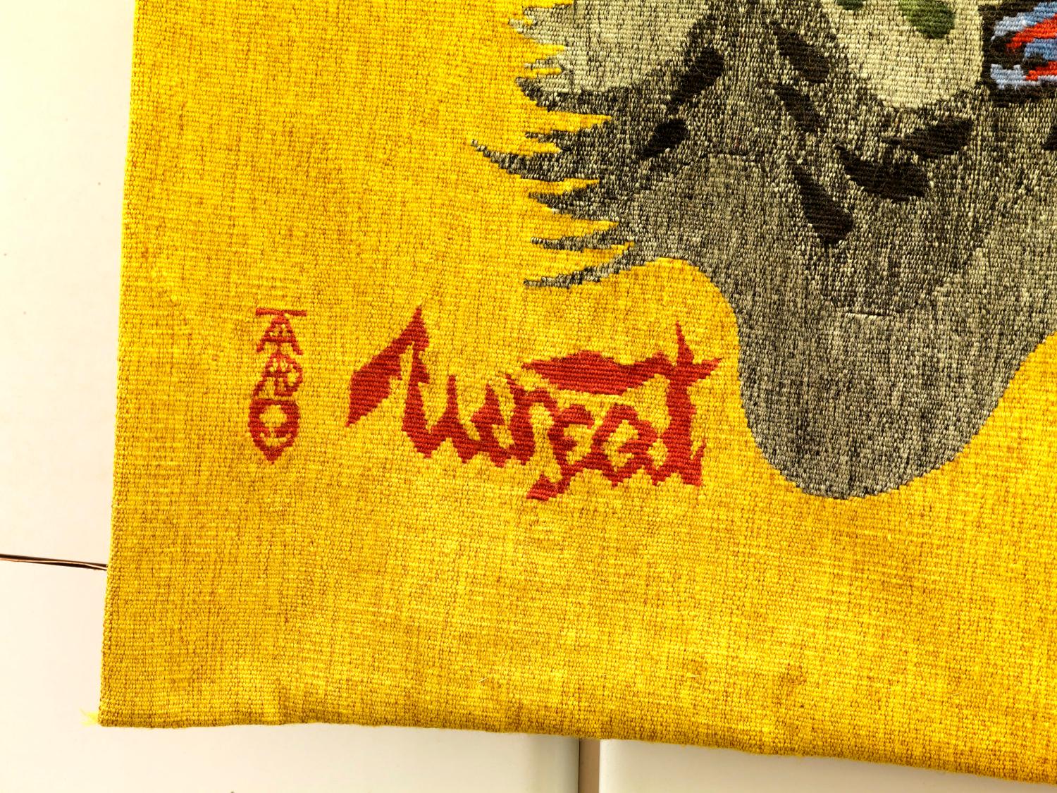 2014, monogramme de l'atelier Tabard d'Aubusson et signature de Jean Lurçat sur la tapisserie Fragment III.