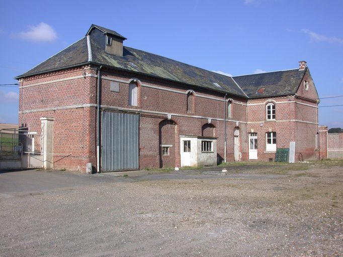 Logement du meunier et entrepôt industriel, façade sur cour.