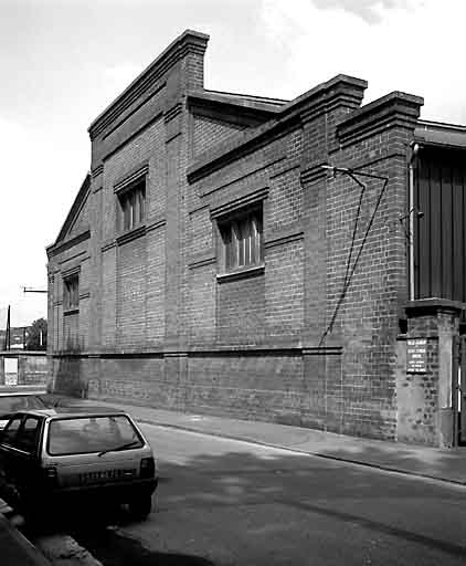 Atelier de fabrication, pignon sud sur rue, vue générale.