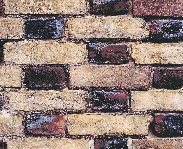 Logement, atelier de fabrication, élévation extérieure Sud sur rue, appareil régulier en damier de briques bicolores, détail