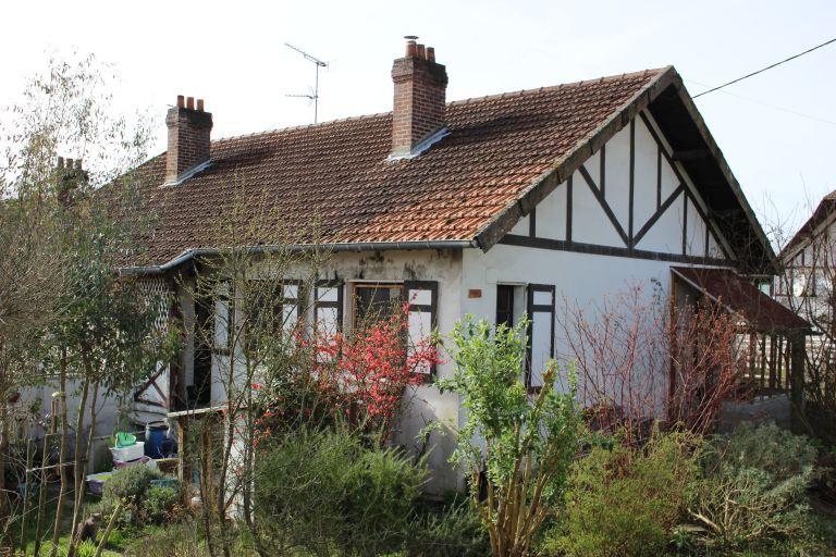 Ensemble de 6 maisons mitoyennes.