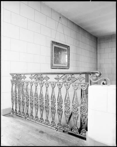 Ferronnerie d'appui au palier de l'escalier.