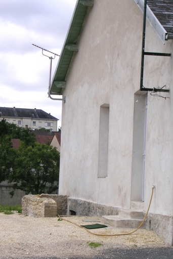 Pignon remanié d'une maison ouvrière.