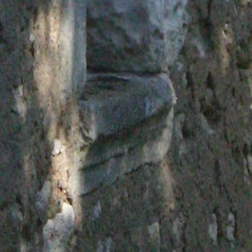 Appui de baie à l'arrière du bâtiment de grange et étables.