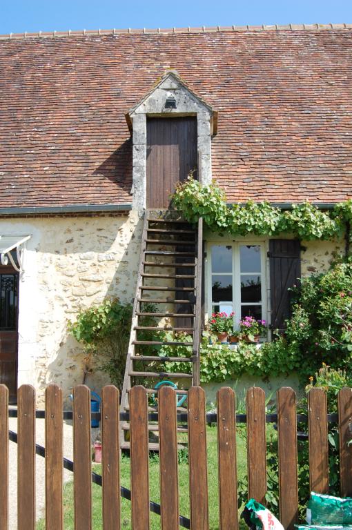 Logis, vue de détail de la lucarne.