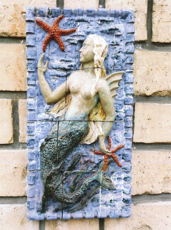 Sirène aux étoiles de mer.