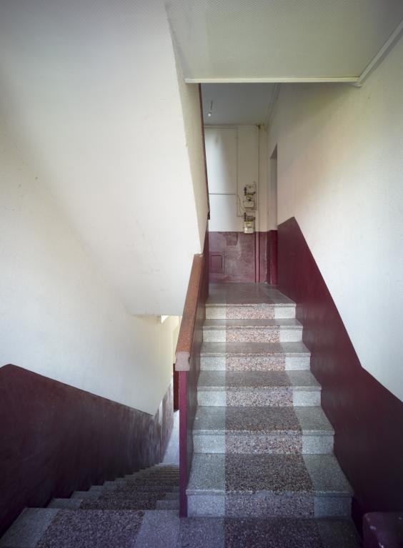 Exemple d'escalier avec revêtement en granito polychrome, 21 avenue du Président-Wilson.