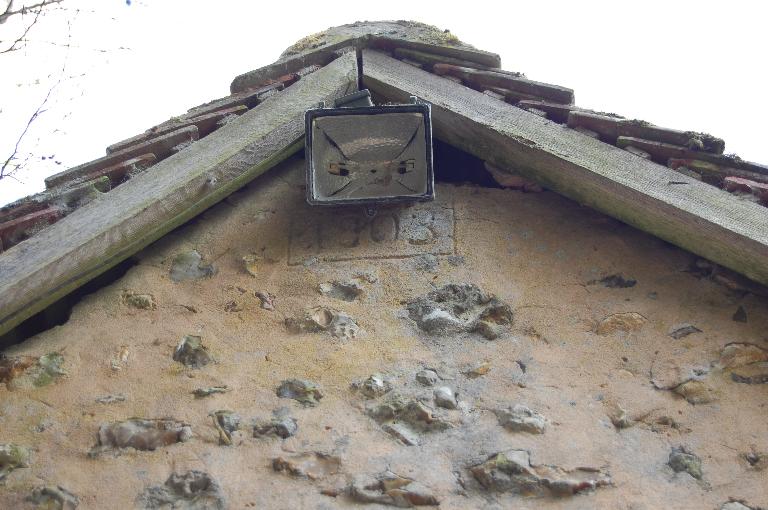 Pignon est, détail de la date portée.