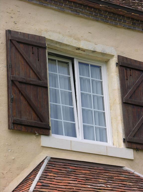 Face est, premier étage, première travée.